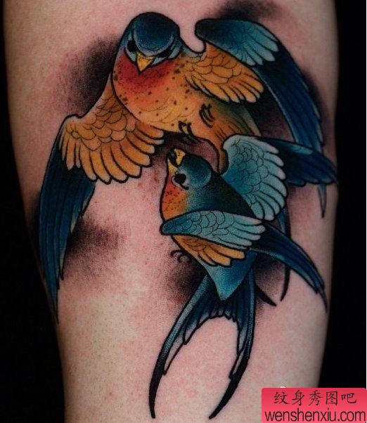 胳膊双飞燕纹身图案