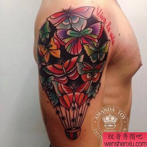 一幅大臂彩色蝴蝶纹身图案