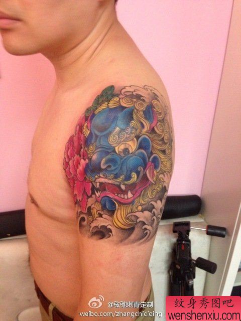 文身秀图吧推荐一幅手臂唐狮文身作品