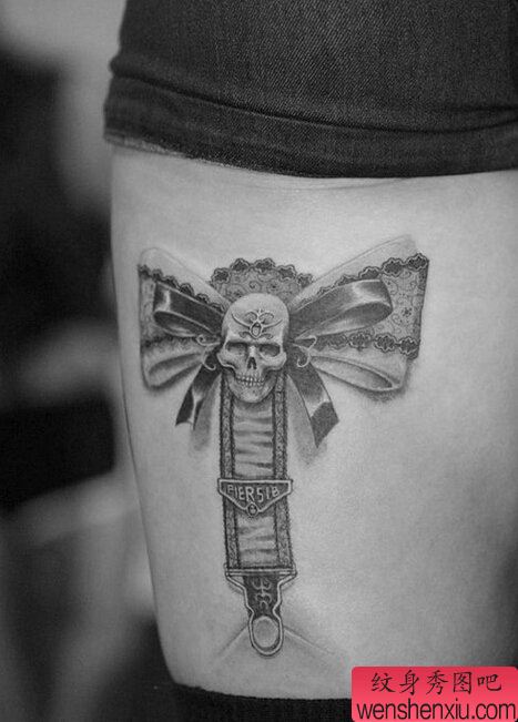文身推荐一幅女人腿部骷髅头蝴蝶结文身作品