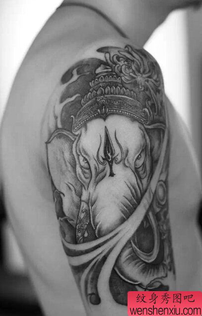 文身秀图吧推荐一幅创意大臂象神文身作品