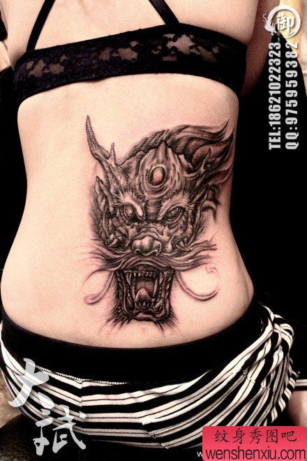 美女腰部霸气的龙头纹身图案
