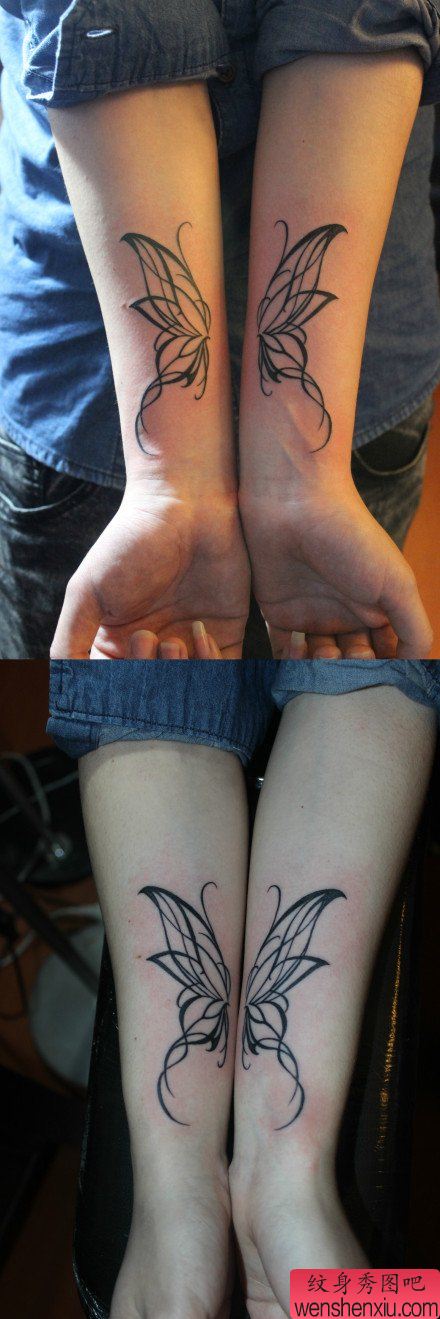 女生手臂清晰精美的图腾蝴蝶纹身图案