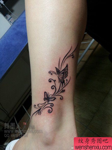 女生腿部精美流行的图腾蝴蝶藤蔓纹身图案