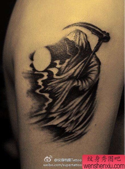 手臂流行帅气的黑白死神纹身图案