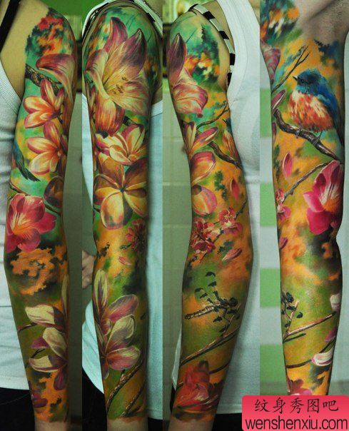 漂亮流行的花臂百合花纹身图案