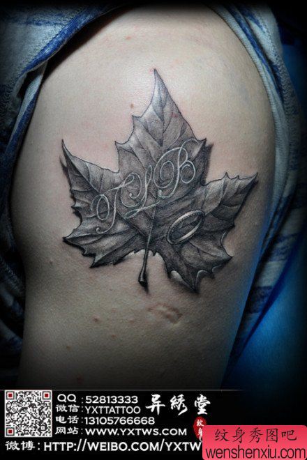 手臂经典流行的一幅黑白树叶纹身图案