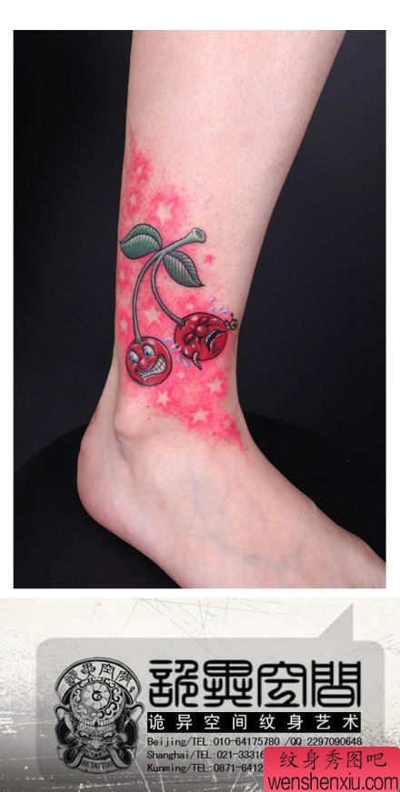 女生腿部经典的一幅哭笑的樱桃纹身图案