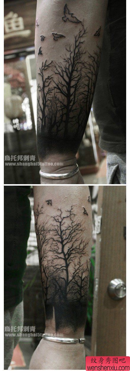 手臂一幅经典帅气的森林纹身图案