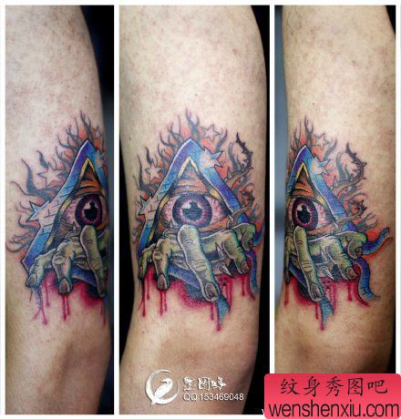 一幅另类很酷的眼睛与鬼手纹身图案