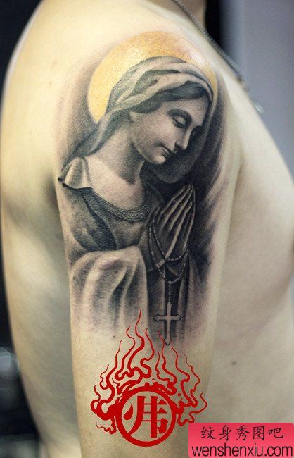 手臂流行流行的圣母纹身图案