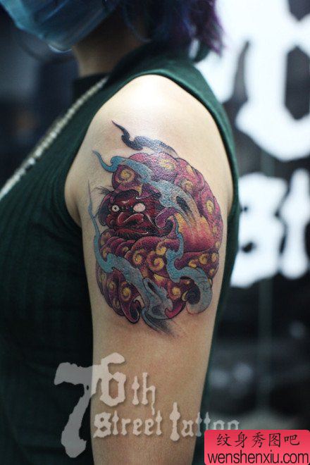 手臂流行经典的达摩纹身图案