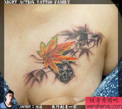 美女胸前好看流行的枫叶与爱心锁纹身图案