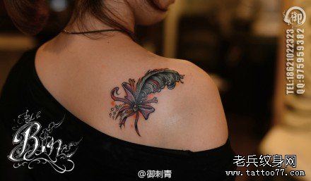 流行好看的羽毛蝴蝶结纹身图案