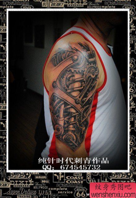 手臂流行超酷的机械臂纹身图案