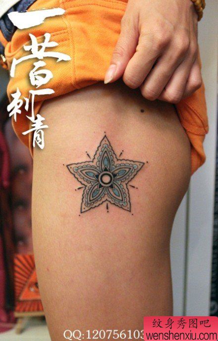 美女腿部小巧精美的五角星纹身图案
