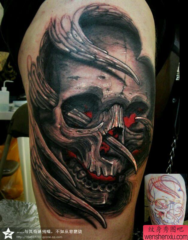 大腿上的一幅立体骷髅纹身作品