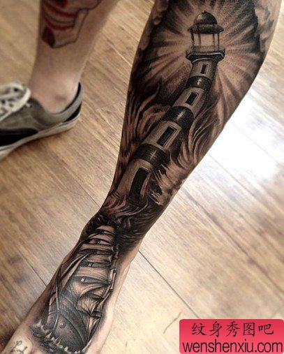 推荐一幅经典的灯塔花腿纹身图片