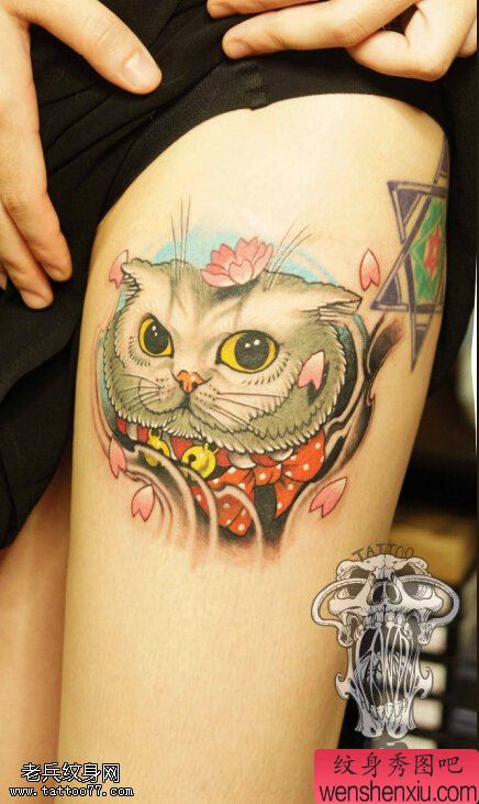 女人腿部猫咪蝴蝶结文身作品