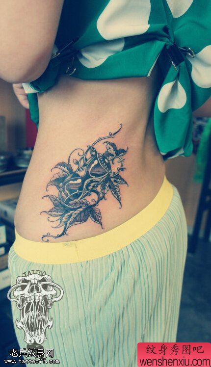 文身秀图吧分享一幅侧腰沙漏文身作品