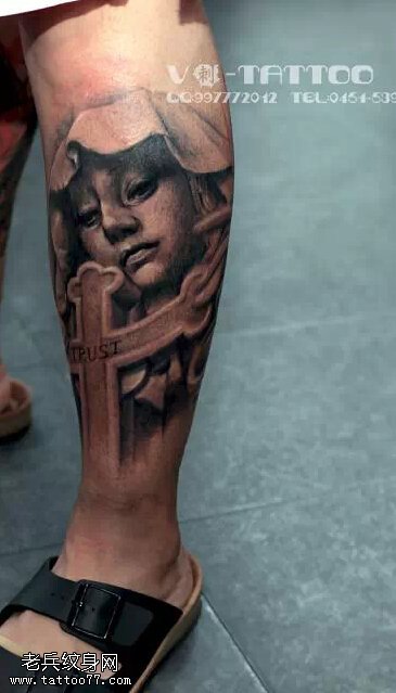腿部玛利亚文身作品由文身秀图吧分享