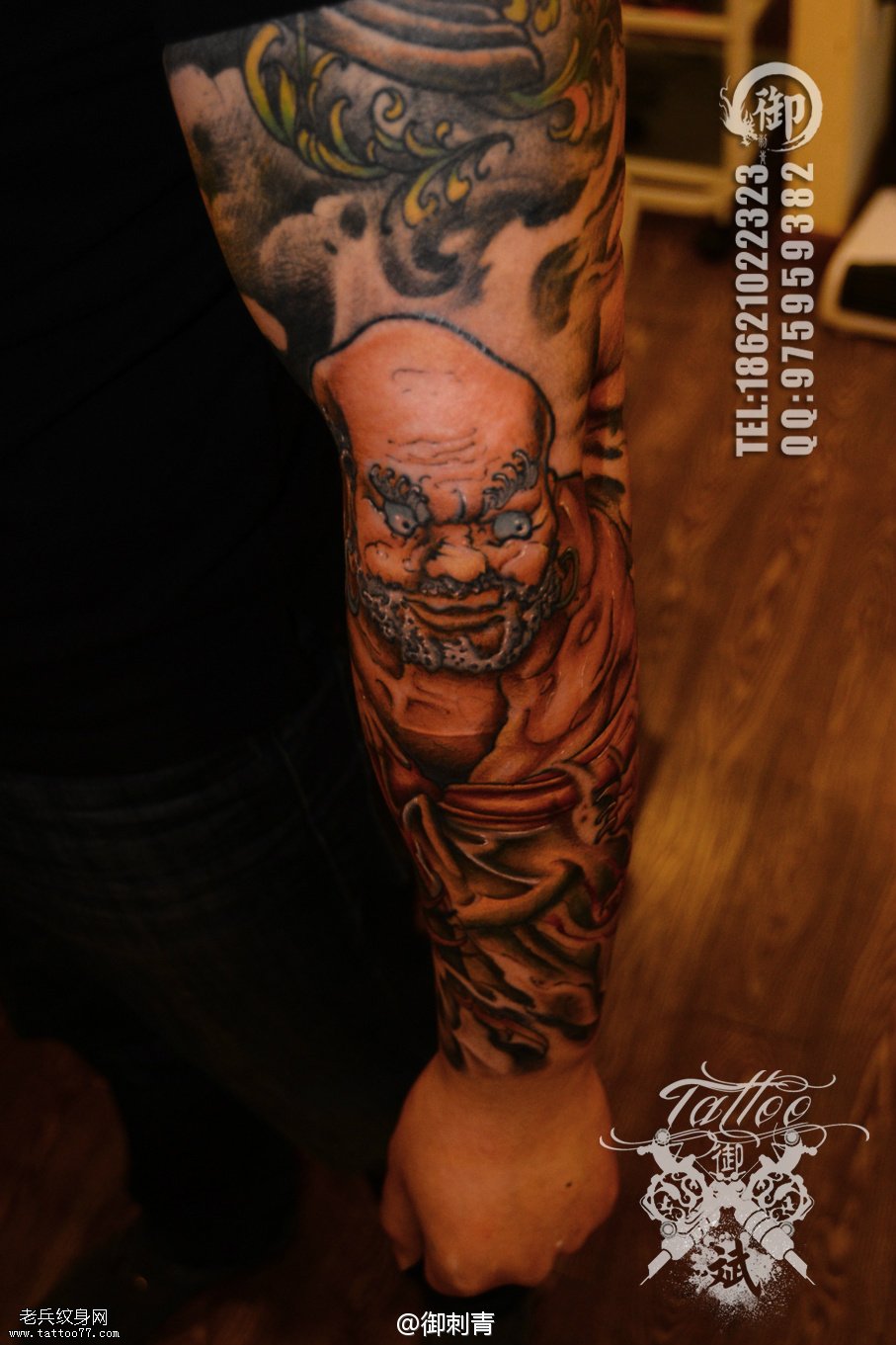 手臂彩色达摩罗汉文身作品由文身分享