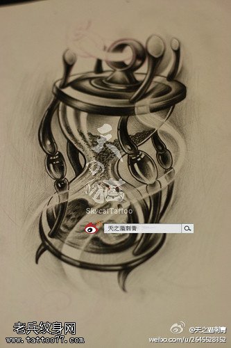 文身秀图吧推荐一幅沙漏文身图片