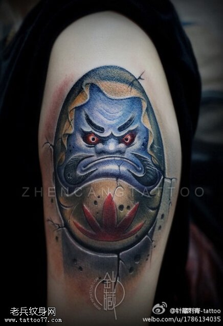 手臂彩色达摩文身作品由文身秀图吧分享
