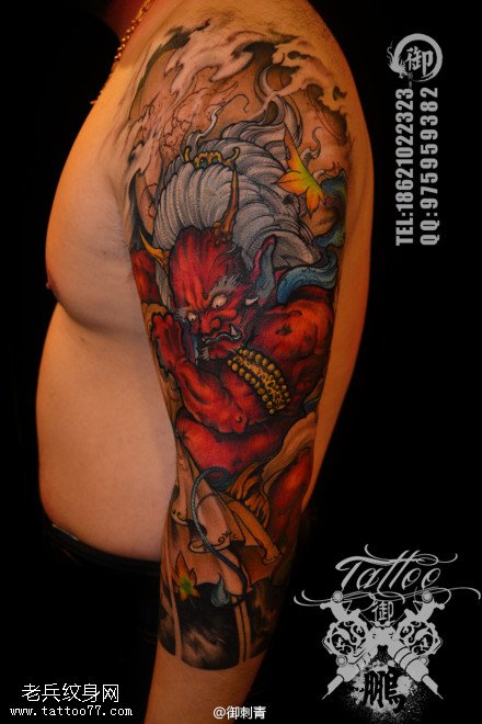 刺青馆推荐一幅手臂彩色不动明王文身作品