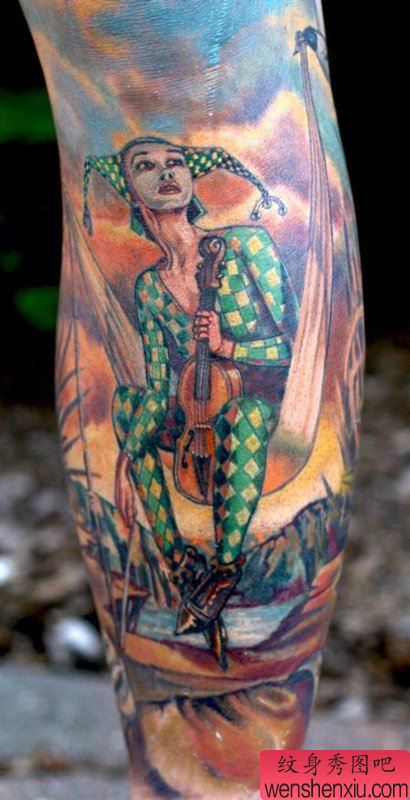 文身秀图吧推荐一幅腿部彩色小丑文身作品