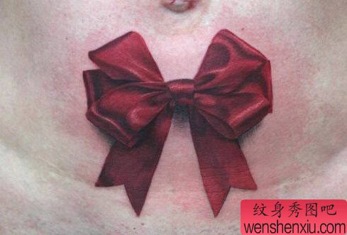 文身秀图吧推荐一幅腹部蝴蝶结文身作品