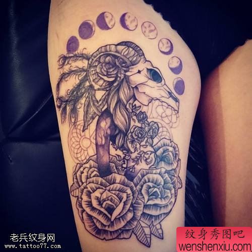 腿部羚羊玫瑰花文身作品由文身秀图吧分享