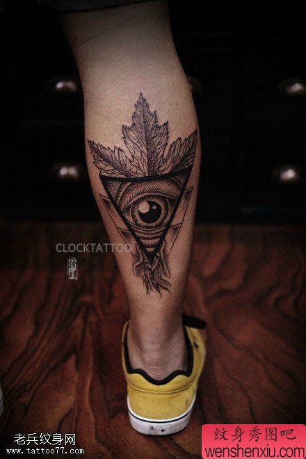 腿部枫叶上帝之眼文身图片