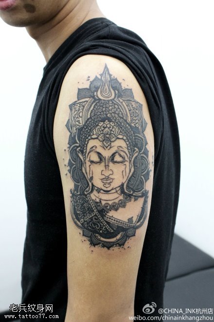文身秀图吧推荐一幅手臂佛头文身作品