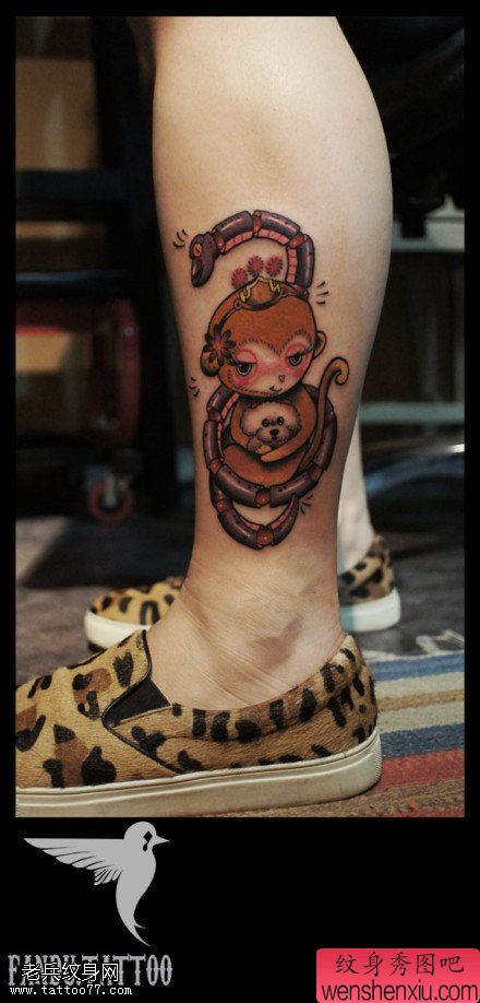 腿部彩色卡通猴子蛇文身作品