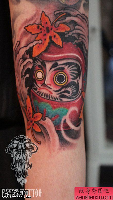 手臂彩色达摩文身作品由文身秀图吧分享