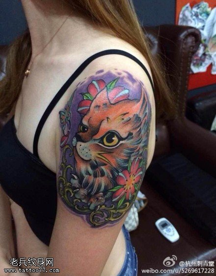 文身秀图吧推荐一幅女人手臂彩色狗狗文身作品