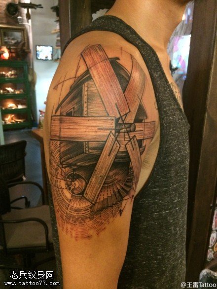 手臂风车文身作品由文身秀图吧分享