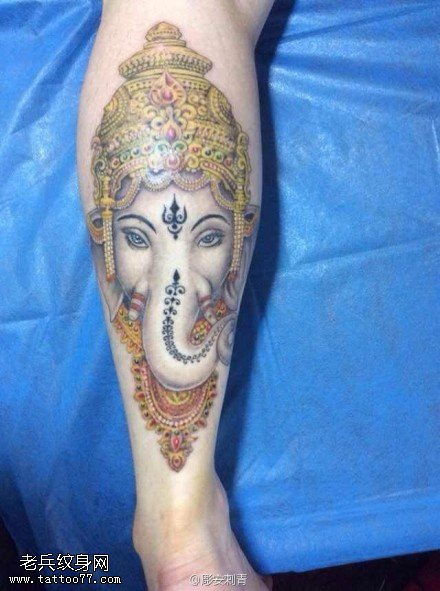 腿部彩色象神文身作品由文身秀图吧分享