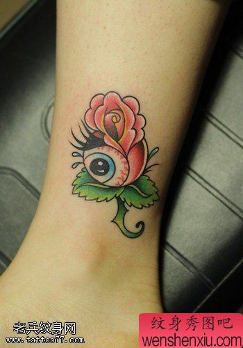 腿部彩色食人花文身作品由文身秀图吧分享