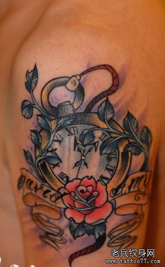 一款手臂时钟字母文身图案