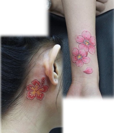 女人纹身图案：头部手臂彩色樱花纹身图案