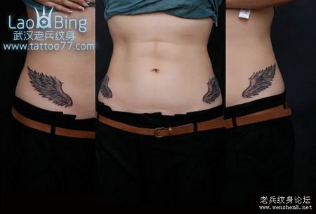腹部纹身图案:美女腹部翅膀纹身图案