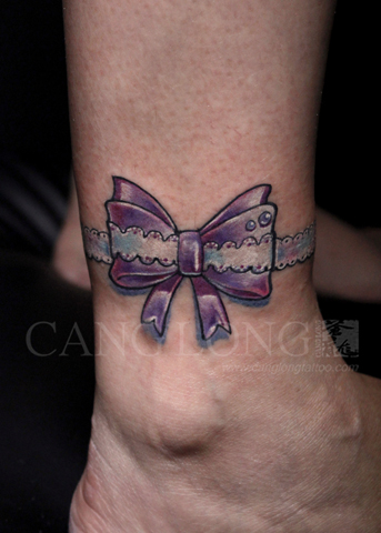 上海纹身秀图吧苍龙纹身作品:脚踝蝴蝶结纹身