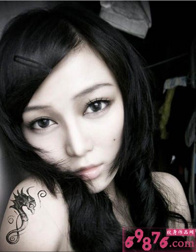 电眼美女海马纹身图片