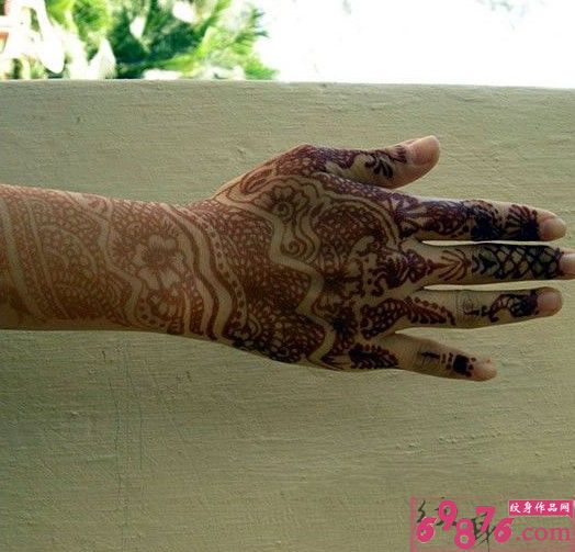 手臂个性宗教纹身图片