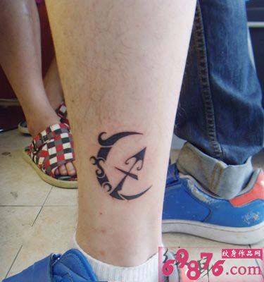 月亮图腾与射手座时尚纹身图片