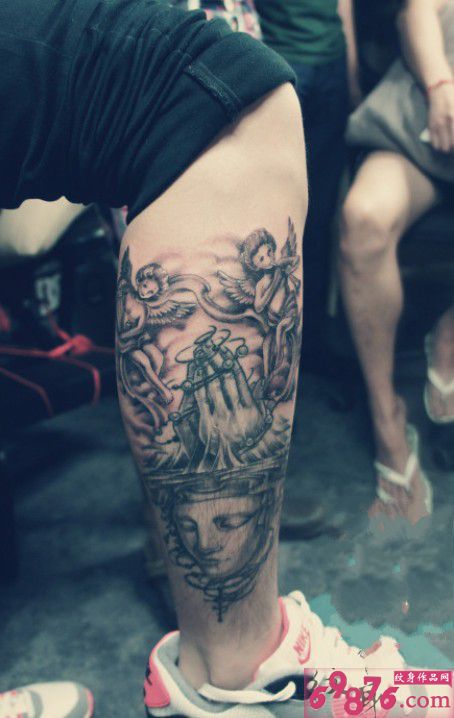 玛利亚的小天使花腿纹身图片