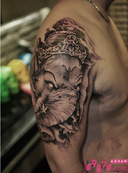传统象神霸气手臂纹身图片
