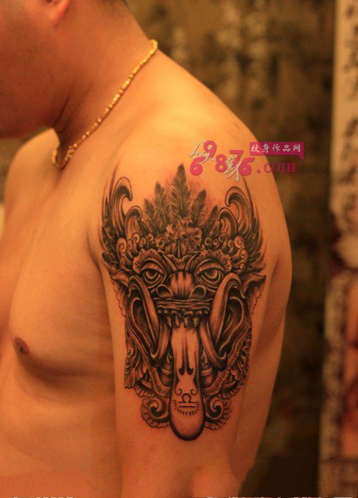 部落酋长面具手臂纹身图片